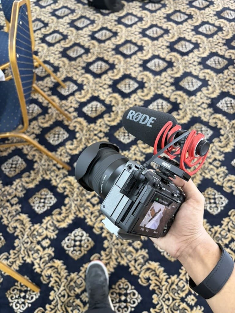Beam Media camera filming the press conference