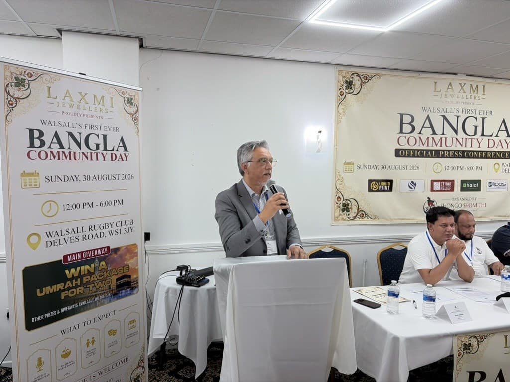 Speaker being filmed at the Bangla Community Day press conference
