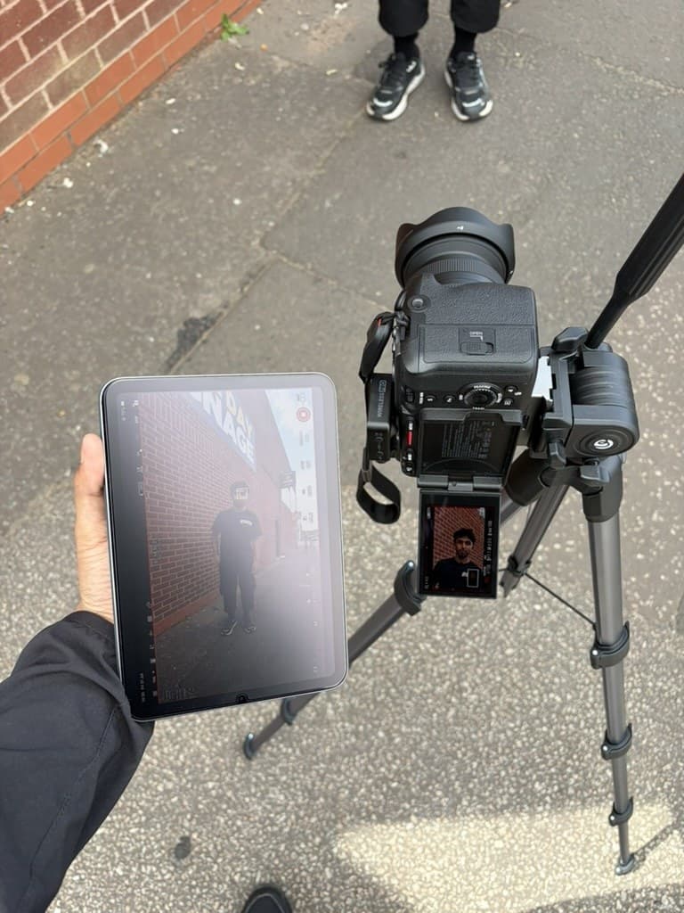 Beam Media professional camera, tripod and monitor setup outside Liquid Print